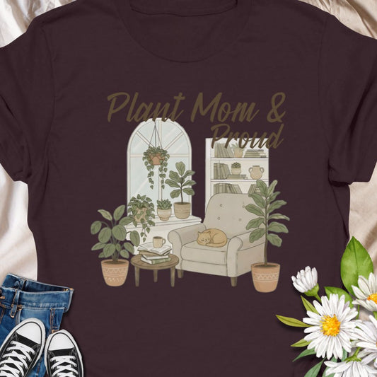 Show your love for houseplants and cozy corners with this ‘Plant Mom & Proud’ shirt. A perfect gift for proud plant moms and home jungle enthusiasts. Designed for gardeners, plant lovers, and green thumbs who know there's always room for one more pot. A fun, botanical-inspired gift for plant moms, or garden addicts.