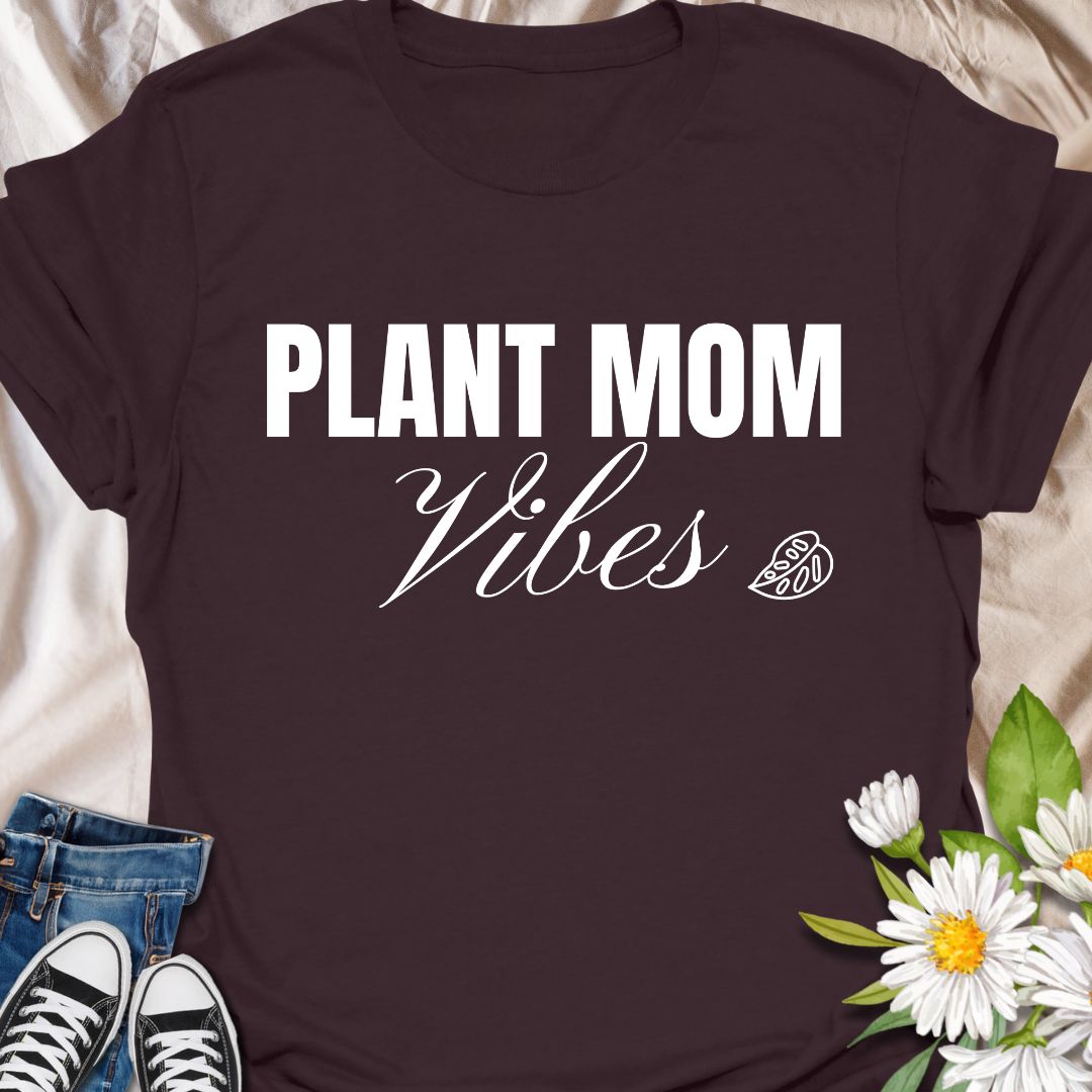 Celebrate your nurturing nature with this adorable “Plant Mom Vibes” t-shirt. Whether you’re tending to your houseplants or just vibing with your leafy family, this tee is perfect for proud plant moms and botanical beauties. Makes a thoughtful gift for birthdays, Mother's Day, or plant-obsessed friends.
