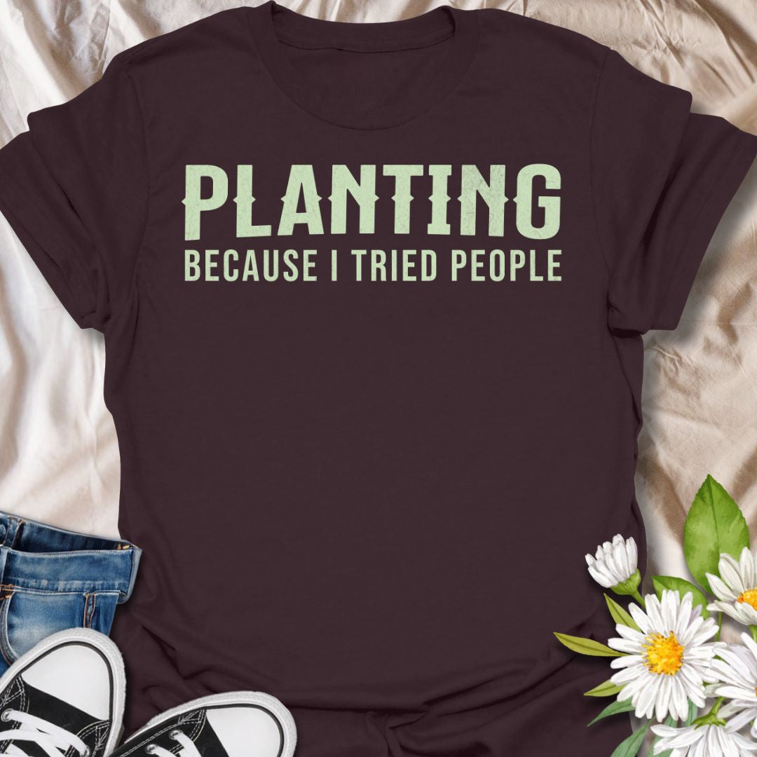This Planting Because I Tried People t-shirt is made for gardeners and plant lovers who prefer soil, seedlings, and quiet plant time over unnecessary social interaction. Featuring bold simple typography with a funny introvert gardening message, this design has a clean, easy-to-wear look for everyday plant-parent style. Perfect for plant moms, plant dads, gardeners, houseplant lovers, introverts, and anyone who has officially chosen planting over people.