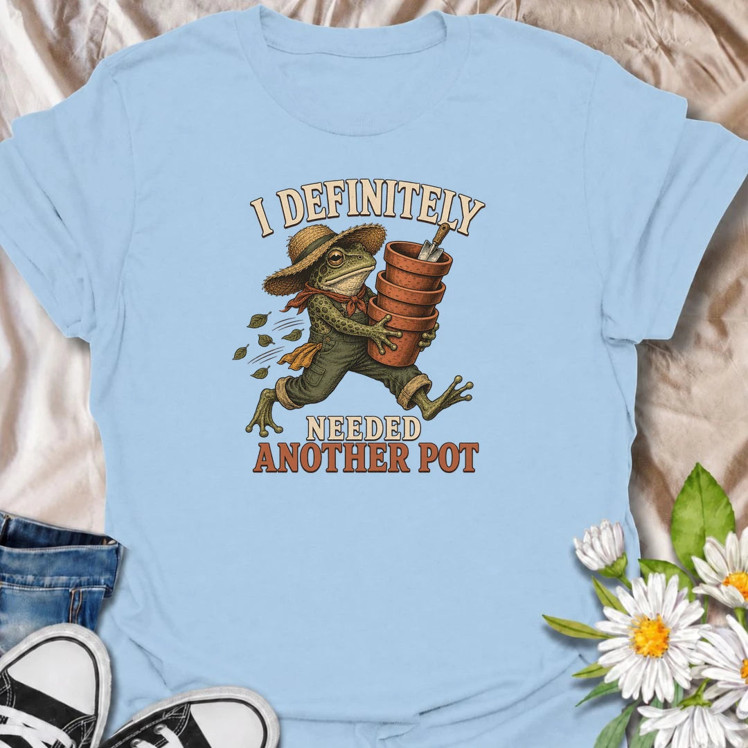 A funny gardening T-shirt for anyone who can always justify bringing home another plant pot. Featuring a determined vintage-style frog carrying a stack of terracotta pots, this design is perfect for gardeners, plant parents, and nursery regulars. The phrase “I Definitely Needed Another Pot” captures the familiar habit of collecting planters almost as quickly as plants. It makes a great gift for houseplant lovers, container gardeners, and anyone who never leaves the garden center empty-handed. Ideal for nurs