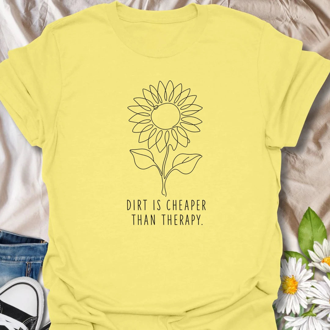 This Dirt Is Cheaper Than Therapy t-shirt is perfect for gardeners who know time in the soil can make everything feel a little better. Featuring a simple sunflower line-art design with a funny gardening phrase, this minimalist botanical tee is great for plant lovers, flower gardeners, backyard growers, and anyone who finds peace, calm, and joy in the garden.