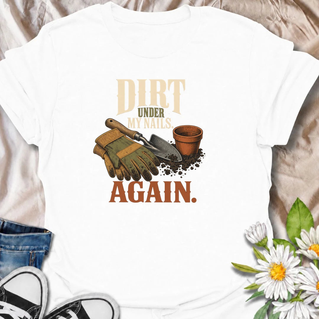 A funny gardening T-shirt for anyone who somehow ends up with dirt under their nails every time they step outside. Featuring garden gloves, a hand trowel, soil, and a terracotta pot, this design has a warm vintage gardening feel. The phrase “Dirt Under My Nails. Again.” is perfect for gardeners who know there is no such thing as a quick job in the garden. It makes a great gift for flower gardeners, vegetable growers, cottage gardeners, and anyone happiest with their hands in the soil. Ideal for garden days,