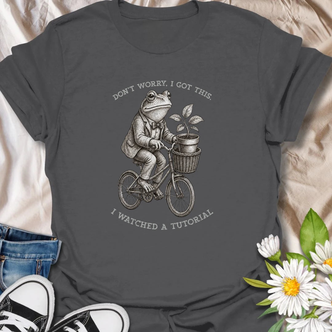 This Don’t Worry I Got This I Watched A Tutorial t-shirt is perfect for gardeners, plant lovers, and DIY plant people who are confidently figuring it out as they go. Featuring a vintage-style frog riding a bicycle with a potted plant in the basket, this funny botanical design is great for plant moms, plant dads, houseplant collectors, beginner gardeners, frog lovers, and anyone who thinks one tutorial is enough to become an expert.