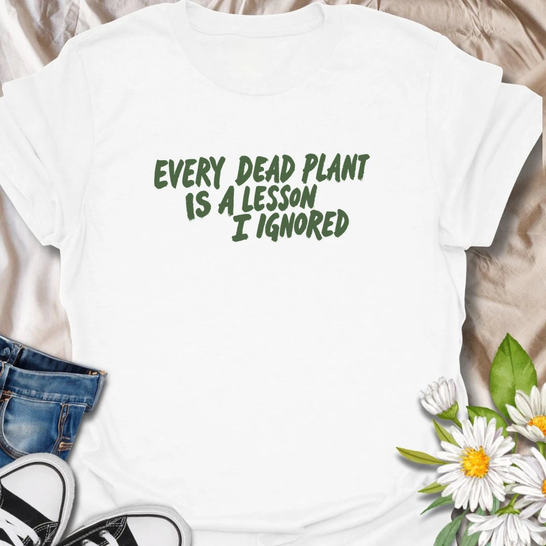 Funny plant t-shirt for anyone whose dead plants were definitely lessons… just not lessons they followed.
Features bold text-only styling with a relatable houseplant humor message for plant lovers and plant parents.
Perfect for houseplant owners, beginner gardeners, and anyone who laughs through the plant struggle.