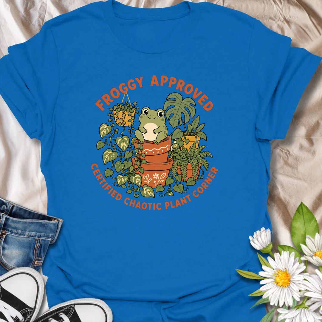 Cute frog and plant t-shirt for anyone with a certified chaotic plant corner.
Features a cheerful frog surrounded by lush houseplants and terracotta pots in a playful, giftable design.
Perfect for frog lovers, plant moms, houseplant collectors, and anyone with a slightly wild indoor jungle.