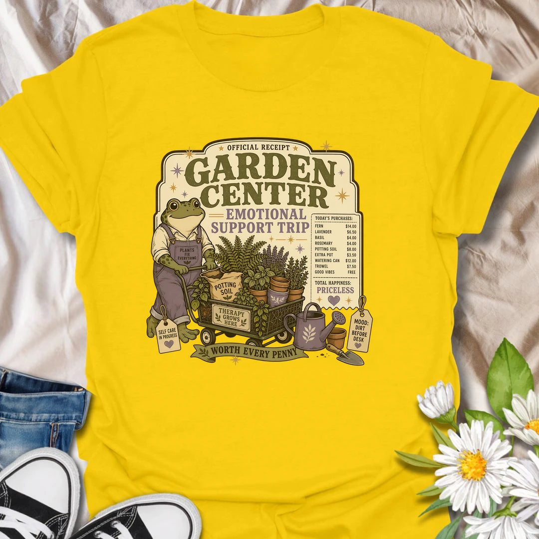Funny gardening t-shirt featuring a cheerful frog and a garden center “emotional support trip.”
This playful design celebrates plant shopping, self-care, and the joy of bringing home more greenery.
A fun gift for gardeners, frog lovers, plant moms, and anyone who believes a garden center trip is worth every penny.