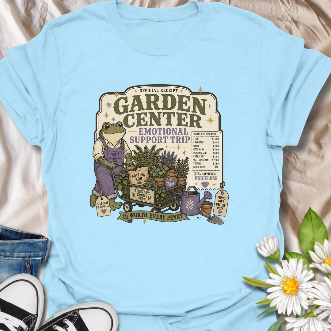 Funny gardening t-shirt featuring a cheerful frog and a garden center “emotional support trip.”
This playful design celebrates plant shopping, self-care, and the joy of bringing home more greenery.
A fun gift for gardeners, frog lovers, plant moms, and anyone who believes a garden center trip is worth every penny.