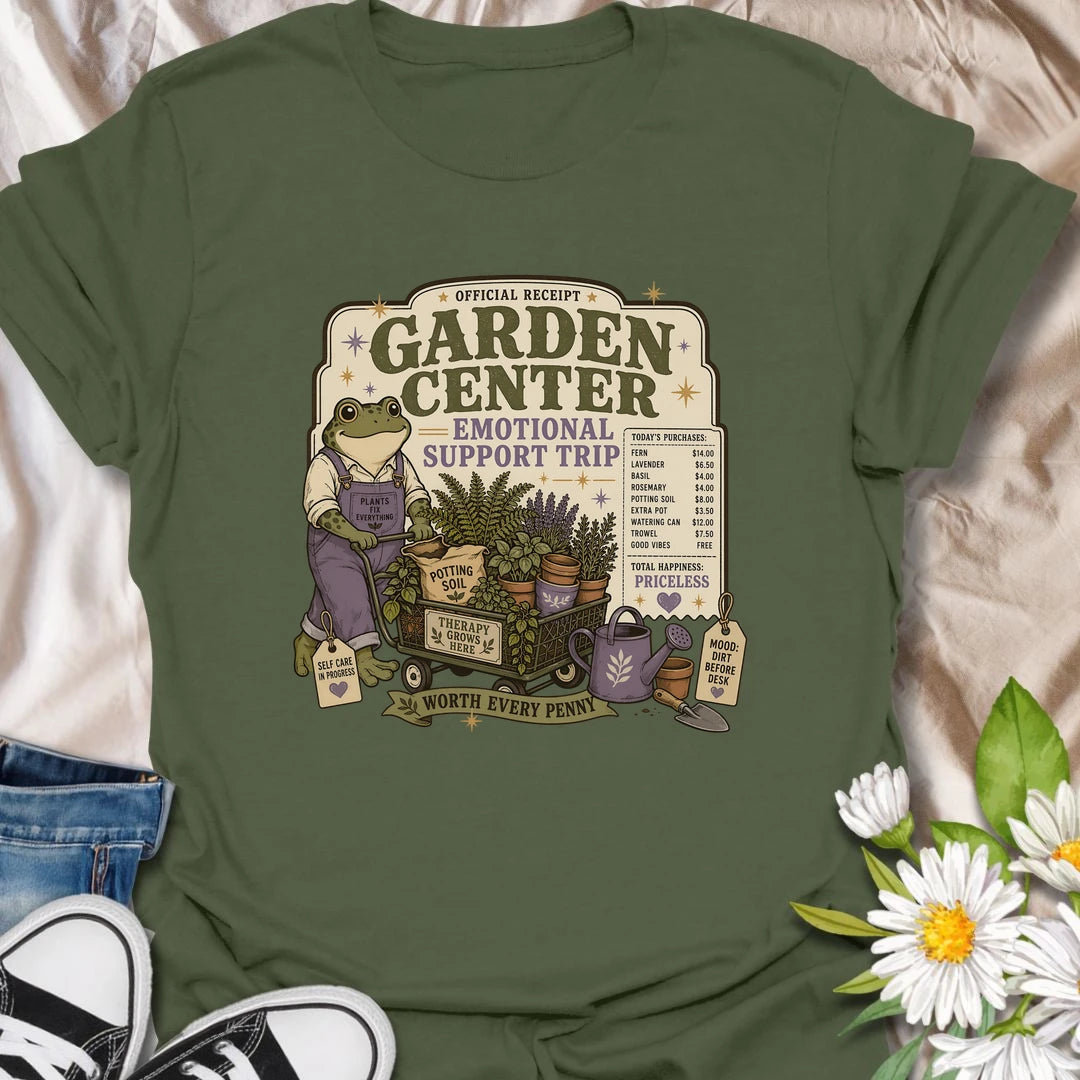Funny gardening t-shirt featuring a cheerful frog and a garden center “emotional support trip.”
This playful design celebrates plant shopping, self-care, and the joy of bringing home more greenery.
A fun gift for gardeners, frog lovers, plant moms, and anyone who believes a garden center trip is worth every penny.