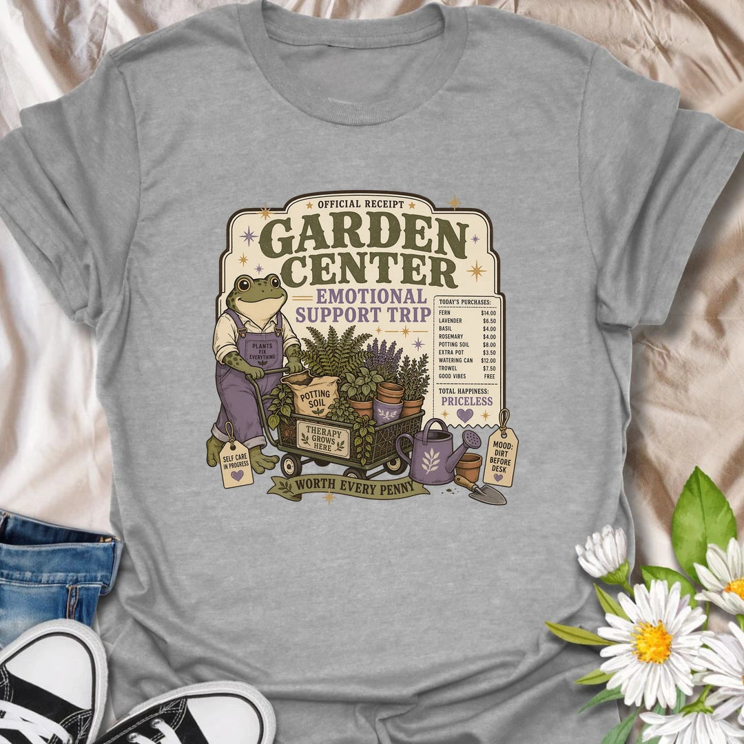 Funny gardening t-shirt featuring a cheerful frog and a garden center “emotional support trip.”
This playful design celebrates plant shopping, self-care, and the joy of bringing home more greenery.
A fun gift for gardeners, frog lovers, plant moms, and anyone who believes a garden center trip is worth every penny.