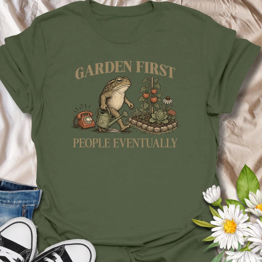 This Garden First People Eventually t-shirt is perfect for gardeners who’d rather be outside with flowers, plants, and pollinators than socializing. Featuring a charming vintage-style garden scene with a hedgehog, snail, and blooming flowers, this botanical tee is ideal for plant lovers, cottage garden fans, backyard gardeners, and anyone with a funny garden-first attitude.