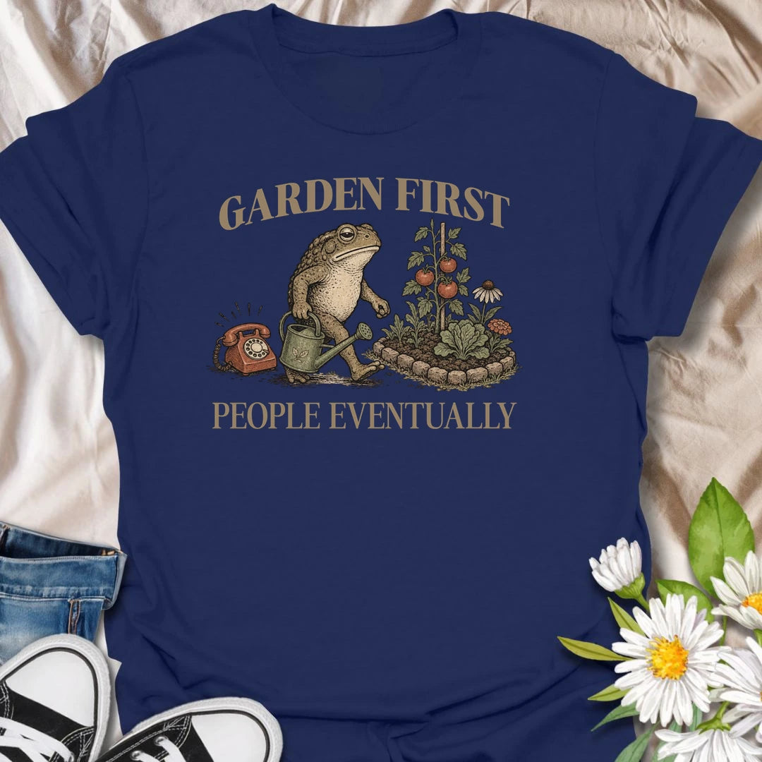 This Garden First People Eventually t-shirt is perfect for gardeners who’d rather be outside with flowers, plants, and pollinators than socializing. Featuring a charming vintage-style garden scene with a hedgehog, snail, and blooming flowers, this botanical tee is ideal for plant lovers, cottage garden fans, backyard gardeners, and anyone with a funny garden-first attitude.