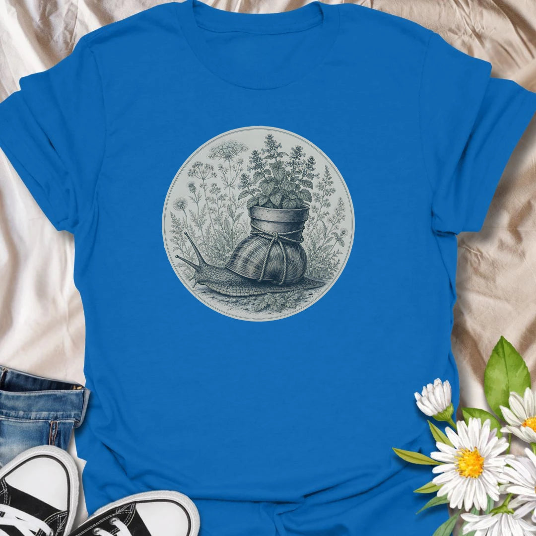 This Garden Snail With Potted Plant t-shirt is made for gardeners, plant lovers, and nature fans who enjoy soft vintage-style botanical artwork. Featuring a detailed garden snail carrying a potted plant on its shell, surrounded by wild herbs, flowers, and naturalist illustration details, this design has a gentle cottagecore feel with classic garden charm. Perfect for gardeners, snail lovers, plant moms, flower fans, botanical art lovers, and anyone who enjoys whimsical nature-inspired designs.
