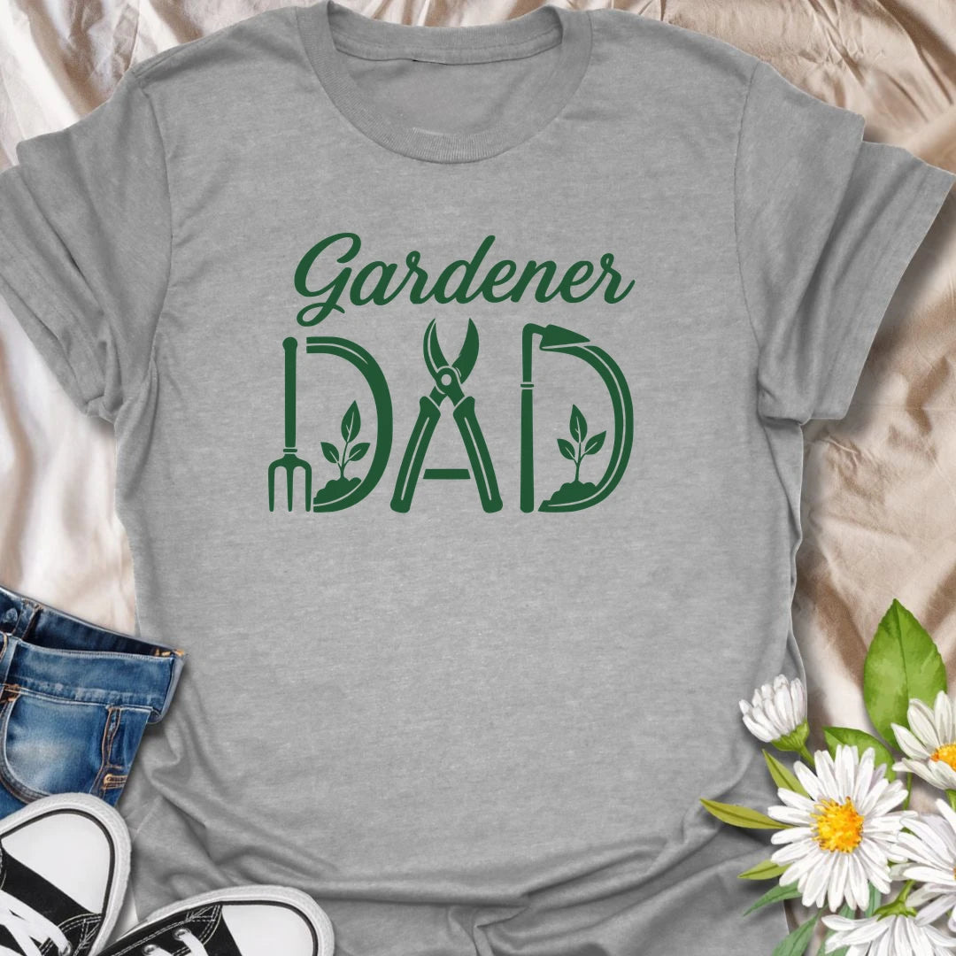 Gardener Dad t-shirt for dads who would rather be outside planting, pruning, watering, or checking on the garden.
The bold text design has a simple, clean look with a subtle garden tool detail inside the lettering.
It is perfect for gardening dads, plant-loving fathers, backyard growers, and men who take pride in their garden.
A thoughtful gift for Father’s Day, birthdays, or any dad who spends his happiest hours in the dirt.