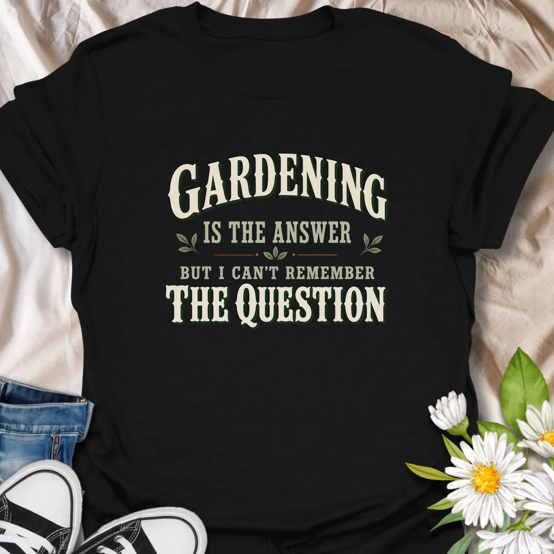 This Gardening Is The Answer t-shirt is made for gardeners who know that time with plants, soil, and fresh air can fix almost anything. Featuring bold vintage-style typography with the funny phrase “But I Can’t Remember The Question,” this design has a classic garden-humor feel that is easy to wear every day. Perfect for plant lovers, backyard gardeners, flower fans, vegetable growers, and anyone who believes gardening is always the right answer.