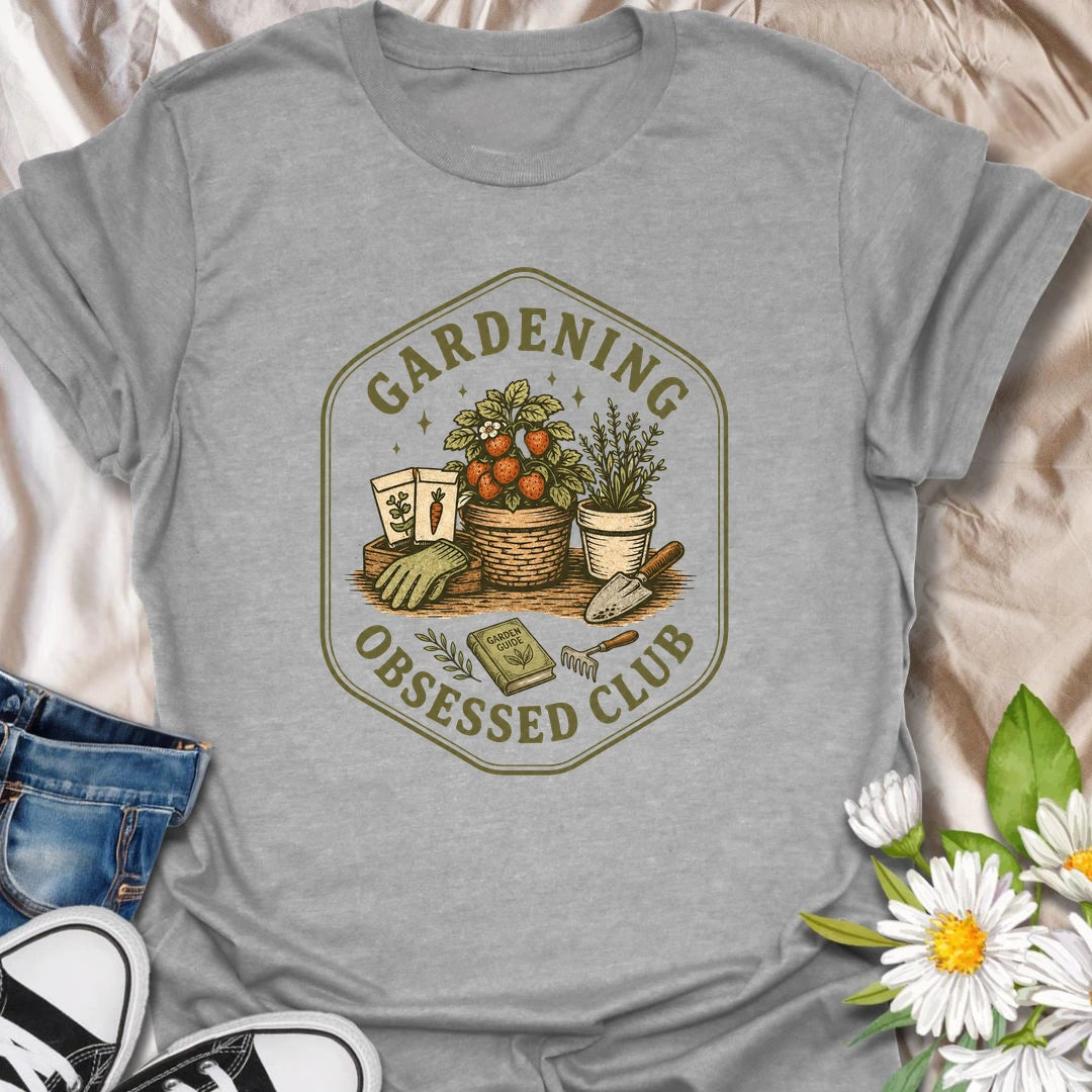 Gardening Obsessed Club t-shirt for anyone who treats gardening like a hobby, lifestyle, and personality trait.
The vintage badge design features baskets, herbs, tomatoes, garden tools, and potted plants in a cozy garden club style.
It is perfect for gardeners, backyard growers, herb lovers, vegetable gardeners, and plant-loving women.
A great gift for anyone who is happiest outside with soil, seeds, and something growing.
