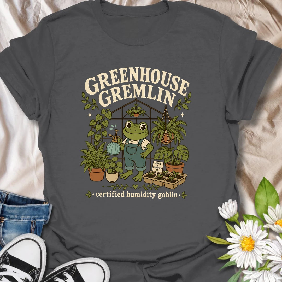 Funny frog greenhouse t-shirt for plant lovers with a chaotic but lovable garden personality.
Features a cheerful frog in overalls surrounded by lush plants and greenhouse vibes.
Perfect for frog lovers, greenhouse fans, houseplant collectors, and anyone who embraces chlorophyll-fueled chaos.