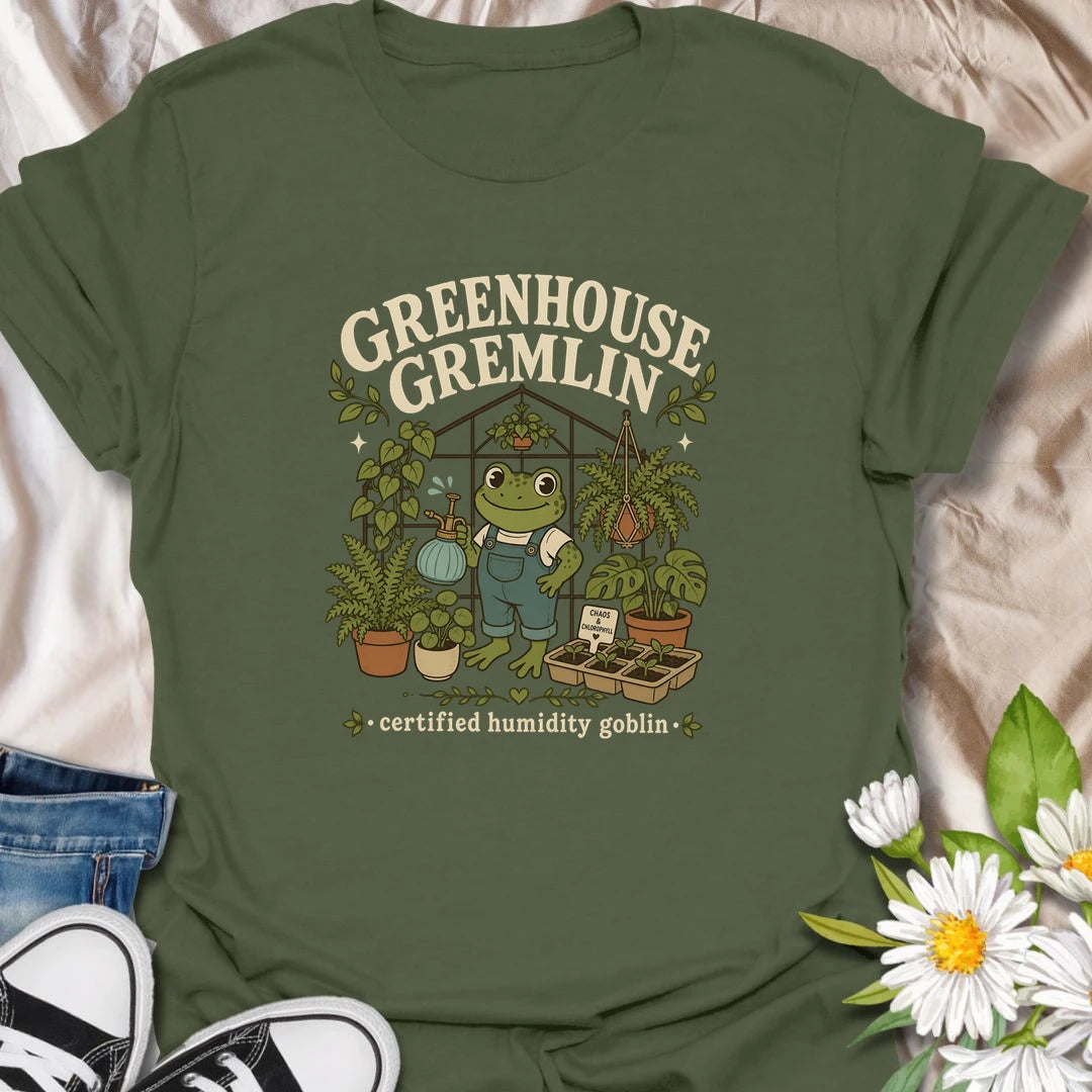Funny frog greenhouse t-shirt for plant lovers with a chaotic but lovable garden personality.
Features a cheerful frog in overalls surrounded by lush plants and greenhouse vibes.
Perfect for frog lovers, greenhouse fans, houseplant collectors, and anyone who embraces chlorophyll-fueled chaos.
