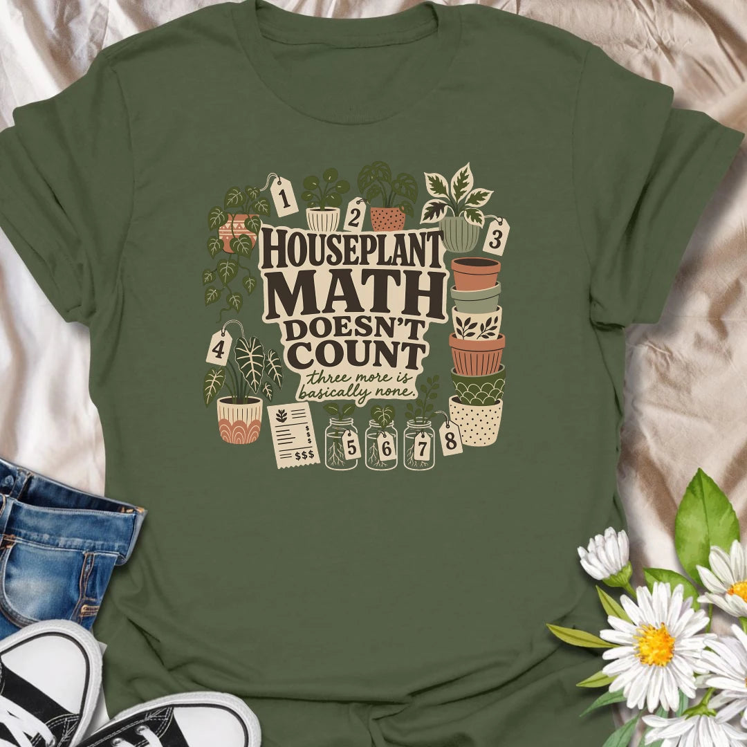 Plant numbers are always negotiable with this “Houseplant Math Doesn’t Count” T-shirt. Surrounded by numbered plants, decorative pots, cuttings, and a suspiciously long receipt, the design is perfect for enthusiastic indoor gardeners. It makes a funny gift for plant collectors who believe three more is basically none.