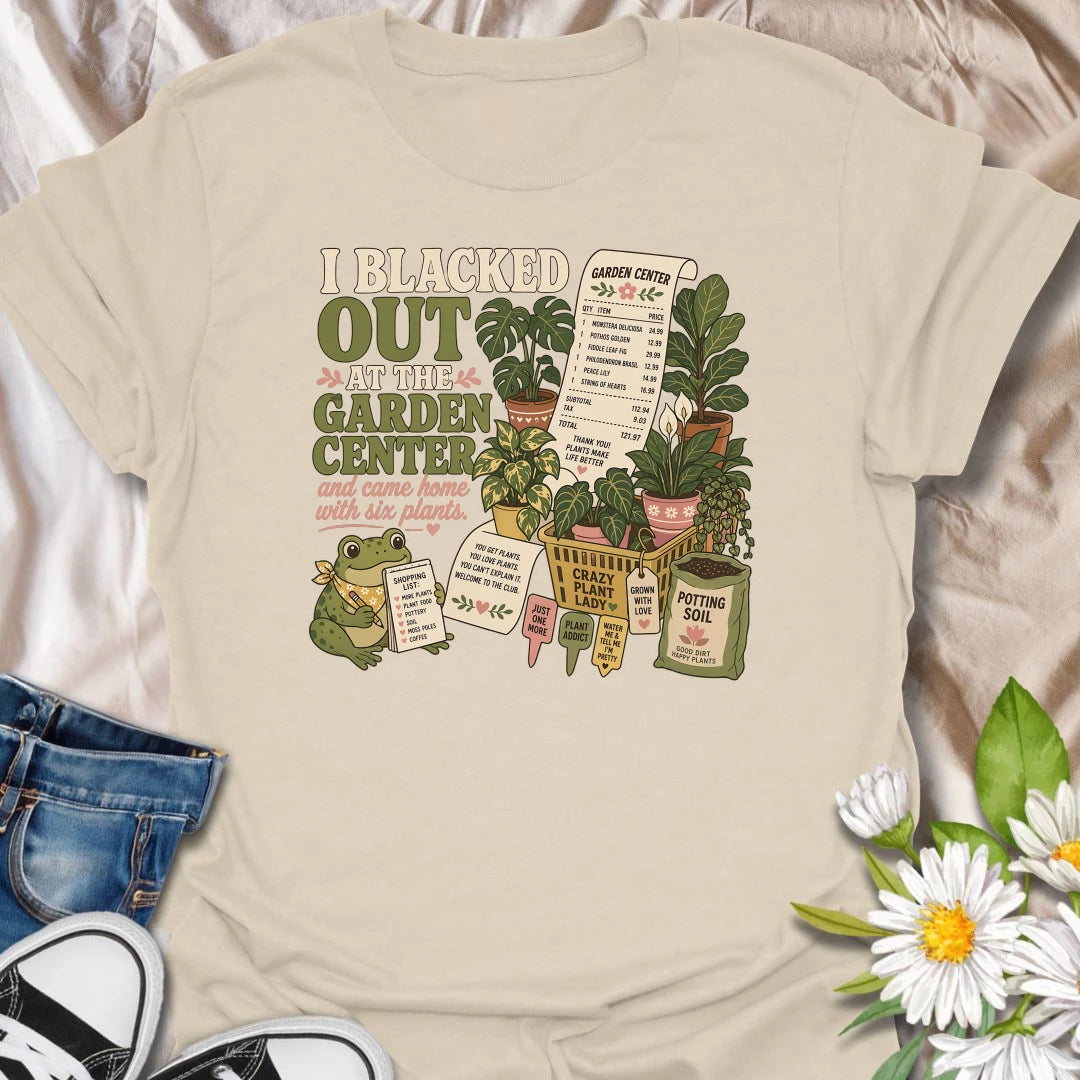 Explain that unexpected plant haul with this “I Blacked Out at the Garden Center” T-shirt. Featuring six houseplants, a long receipt, shopping basket, potting soil, and a cheerful frog, it is perfect for impulsive plant shoppers. A funny gift for anyone who enters the nursery for one item and leaves with a collection.