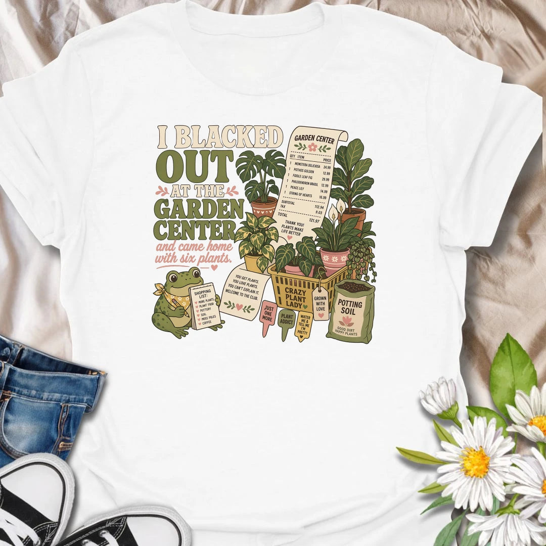 Explain that unexpected plant haul with this “I Blacked Out at the Garden Center” T-shirt. Featuring six houseplants, a long receipt, shopping basket, potting soil, and a cheerful frog, it is perfect for impulsive plant shoppers. A funny gift for anyone who enters the nursery for one item and leaves with a collection.