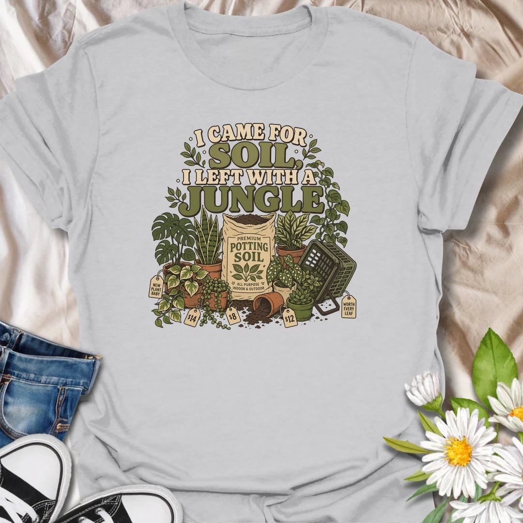 Celebrate an accidental plant haul with this “I Came for Soil, I Left With a Jungle” T-shirt. Featuring a bag of potting soil surrounded by lush houseplants and price tags, it is perfect for devoted plant shoppers. A funny gift for anyone whose quick nursery visit becomes a full indoor jungle.