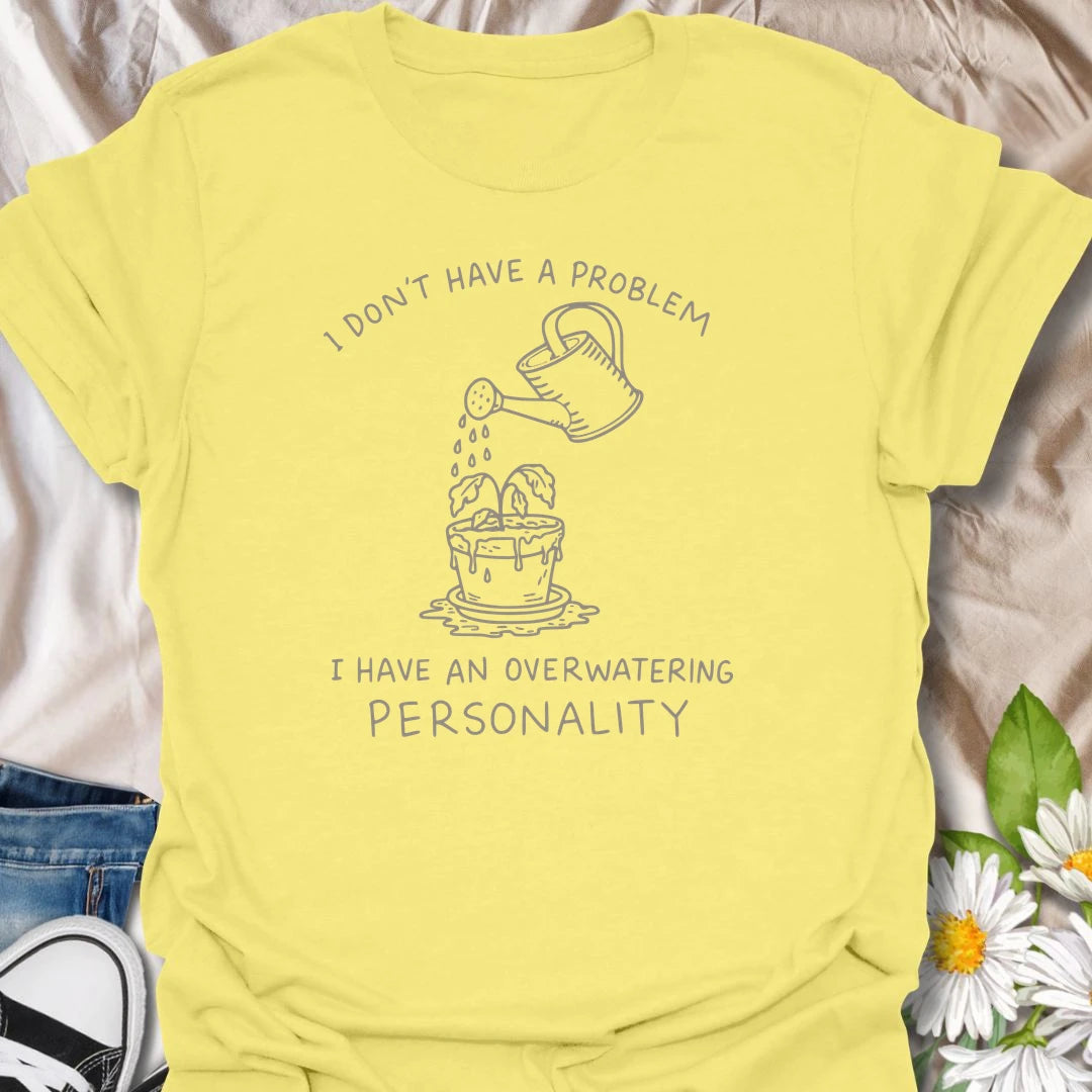 This I Have An Overwatering Personality t-shirt is perfect for plant lovers who care a little too much and water a little too often. Featuring a simple watering can line-art design with a droopy potted plant and funny botanical text, this plant humor tee is great for plant moms, plant dads, beginner plant parents, indoor gardeners, and anyone who loves their houseplants with slightly too much enthusiasm.