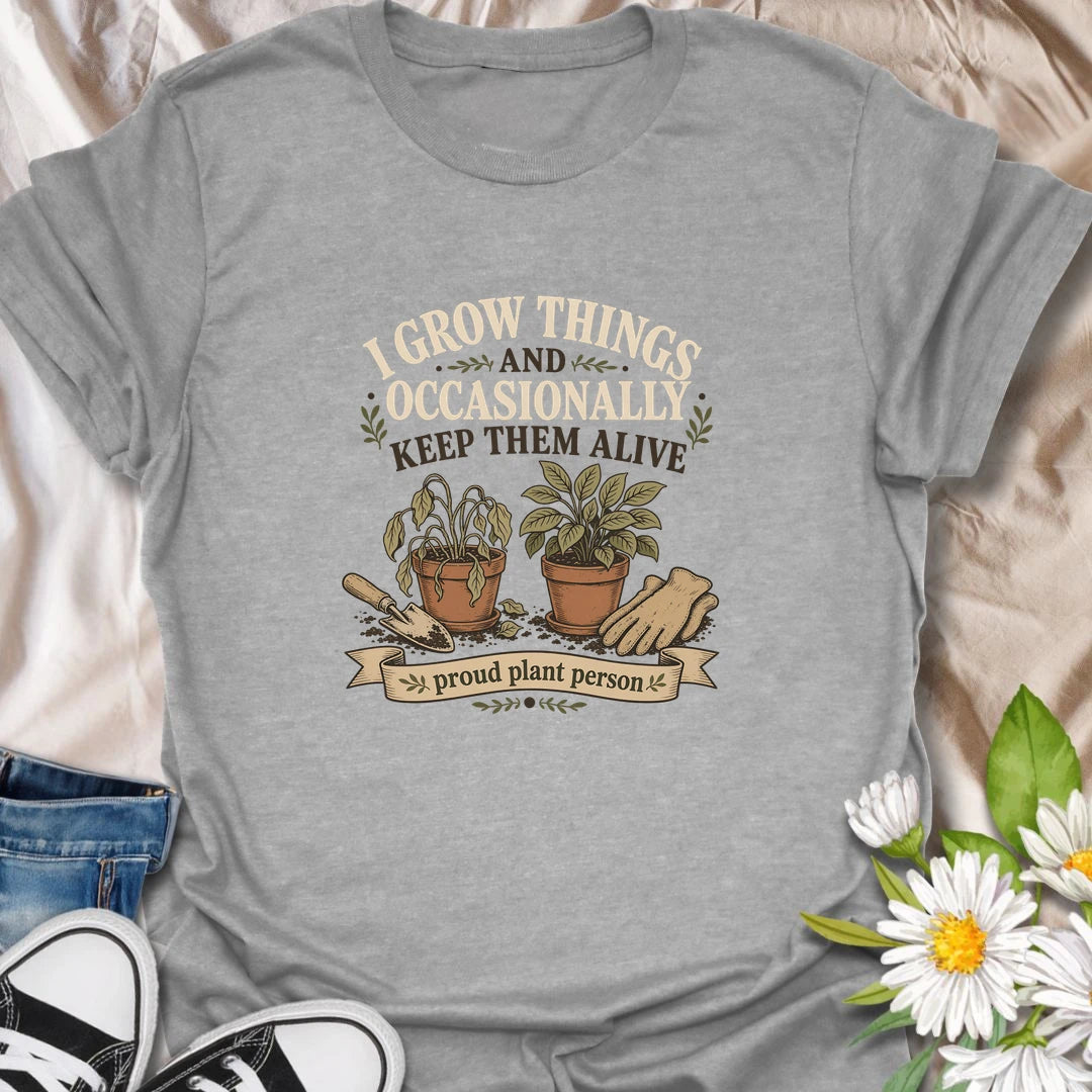 Funny gardening t-shirt for anyone who grows things and occasionally keeps them alive.
Features potted plants, gardening gloves, and a playful message that plant lovers will instantly relate to.
A fun gift for gardeners, beginner plant parents, and anyone with a realistic green thumb.