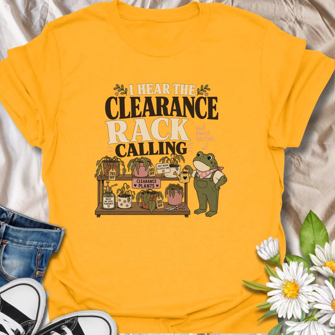 A funny plant rescue T-shirt for anyone unable to walk past the clearance section. The design features a helpful frog tending a collection of slightly sad discounted plants. A charming gift for bargain plant shoppers, plant rescuers, and anyone convinced every neglected houseplant deserves another chance.