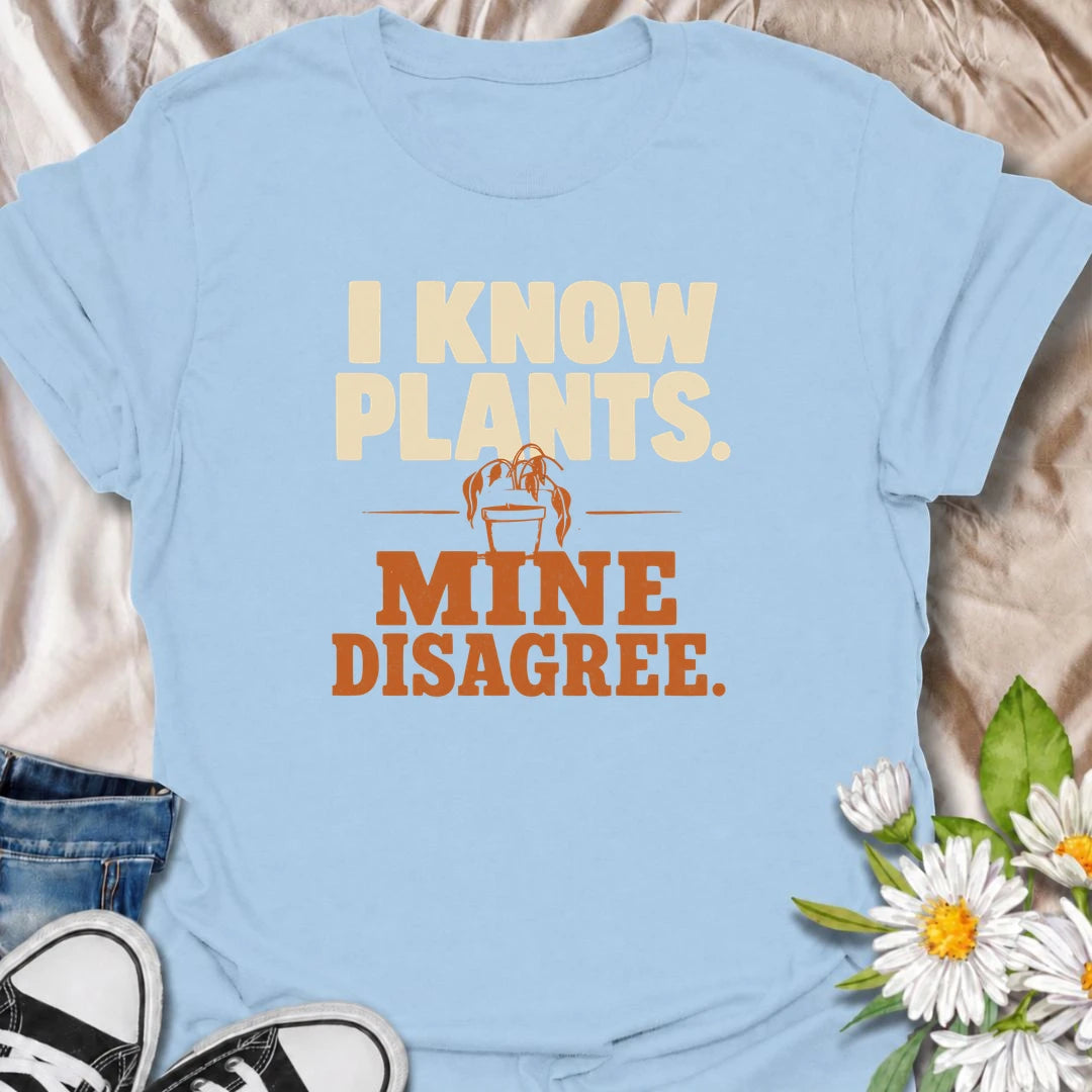 A funny plant T-shirt for anyone who knows plenty about houseplants but still somehow has one looking less than impressed. The bold “I Know Plants. Mine Disagree.” phrase captures the reality of plant parenting with just the right amount of self-deprecating humor. Perfect for houseplant lovers, indoor gardeners, and plant collectors who have learned that knowledge does not always equal cooperation. A great gift for pothos fans, propagation addicts, and anyone with a dramatic plant collection. Easy to wear, 