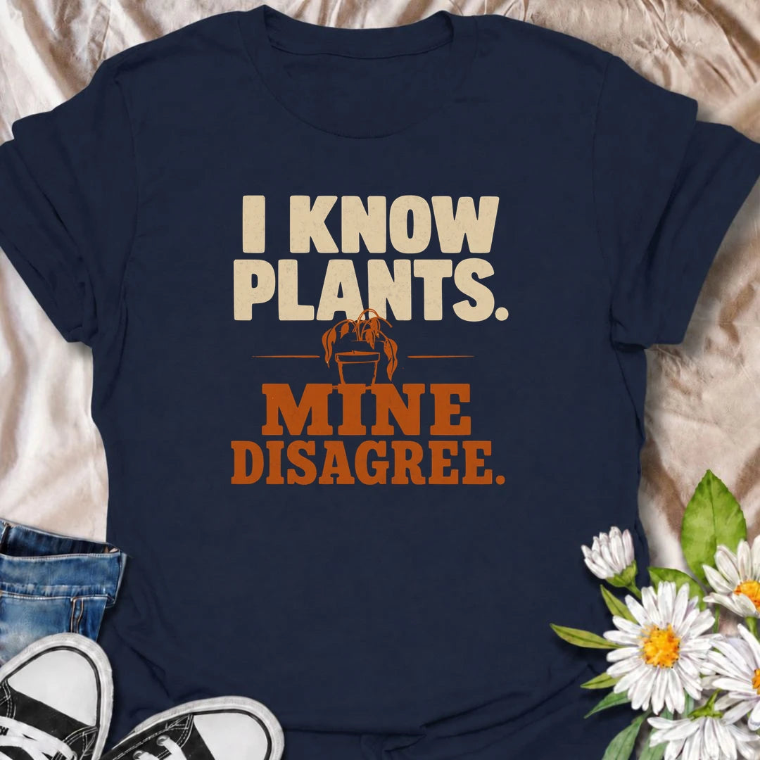 A funny plant T-shirt for anyone who knows plenty about houseplants but still somehow has one looking less than impressed. The bold “I Know Plants. Mine Disagree.” phrase captures the reality of plant parenting with just the right amount of self-deprecating humor. Perfect for houseplant lovers, indoor gardeners, and plant collectors who have learned that knowledge does not always equal cooperation. A great gift for pothos fans, propagation addicts, and anyone with a dramatic plant collection. Easy to wear, 