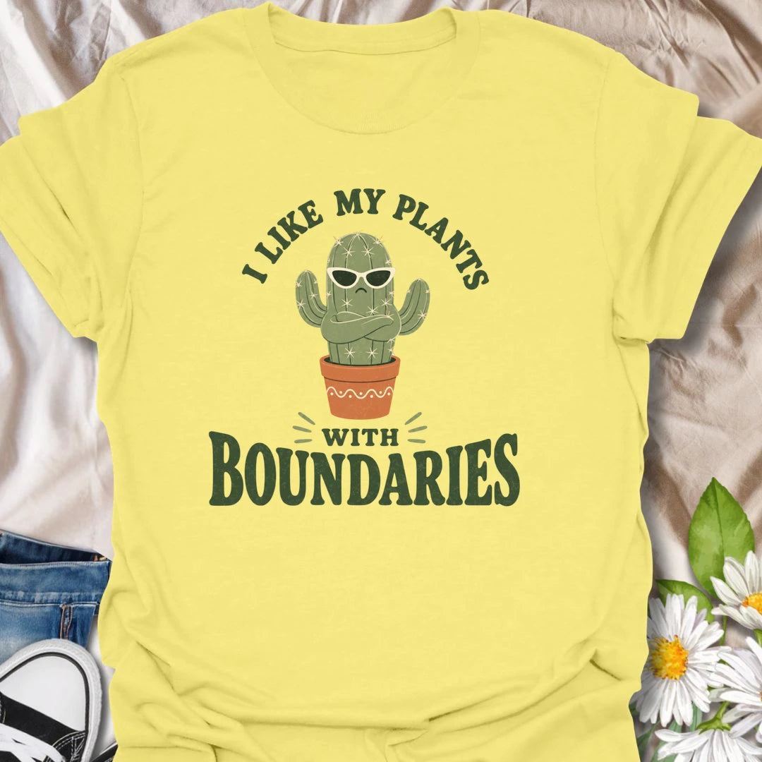 This I Like My Plants With Boundaries t-shirt is made for cactus lovers, succulent fans, and plant people with a sarcastic sense of humor. Featuring a grumpy potted cactus in sunglasses with crossed arms and bold retro lettering, this design has a funny low-maintenance plant vibe with plenty of attitude. Perfect for cactus lovers, plant moms, plant dads, succulent collectors, introverts, and anyone who appreciates plants with strong personal boundaries.