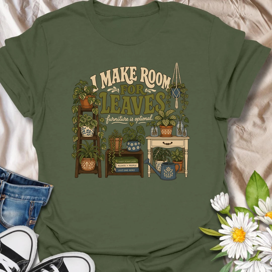 A bold houseplant T-shirt for anyone who believes furniture should never compete with foliage. The detailed design features plant stands, shelves, propagation jars, hanging plants, and a room overflowing with greenery. A wonderful gift for plant collectors, indoor jungle creators, and devoted houseplant lovers.