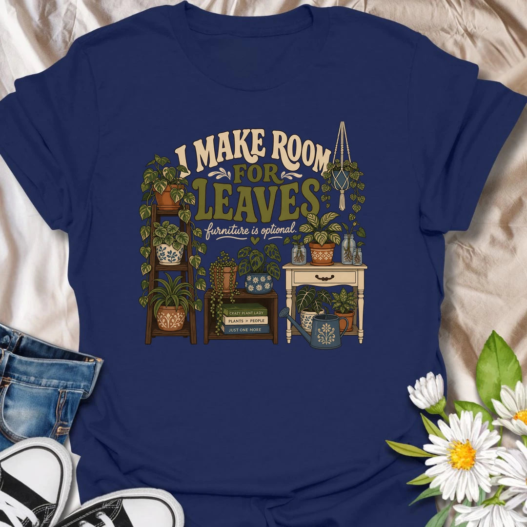 A bold houseplant T-shirt for anyone who believes furniture should never compete with foliage. The detailed design features plant stands, shelves, propagation jars, hanging plants, and a room overflowing with greenery. A wonderful gift for plant collectors, indoor jungle creators, and devoted houseplant lovers.