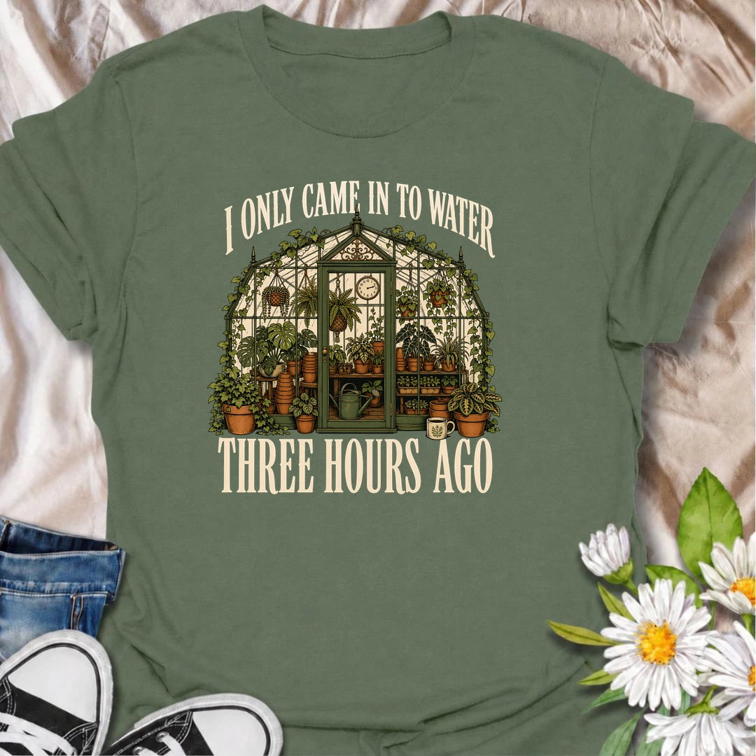 A funny greenhouse T-shirt for plant lovers who visit for one quick watering job and somehow stay for hours. A great gift for gardeners and plant parents.