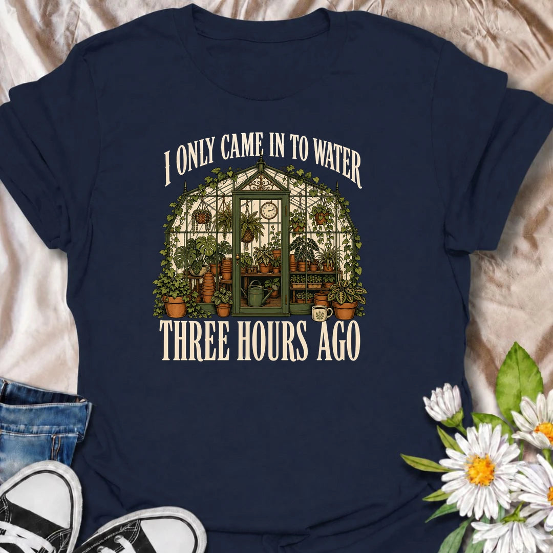 A funny greenhouse T-shirt for plant lovers who visit for one quick watering job and somehow stay for hours. A great gift for gardeners and plant parents.