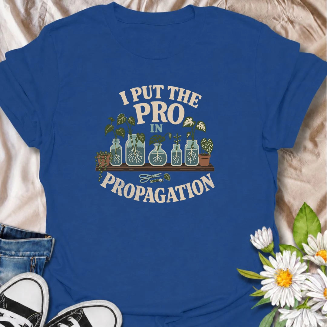 A funny propagation T-shirt for houseplant lovers who have turned rooting cuttings into a full-time hobby. Featuring plant cuttings growing in water-filled jars, this design is made for pothos fans, plant parents, and indoor gardeners. The playful “I Put the Pro in Propagation” phrase makes it a great gift for anyone with a growing collection of propagated plants. Perfect for plant swaps, nursery trips, greenhouse days, or simply showing off your houseplant obsession. A fun botanical graphic tee for anyone 
