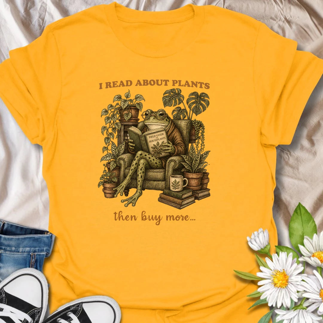 This I Read About Plants t-shirt is perfect for houseplant lovers who enjoy field guides, plant care research, and cozy botanical corners. Featuring a vintage-style frog reading a houseplant guide while surrounded by lush potted plants, books, and a mug, this design is great for plant moms, plant dads, indoor gardeners, frog lovers, and anyone who treats plant care like a serious hobby.