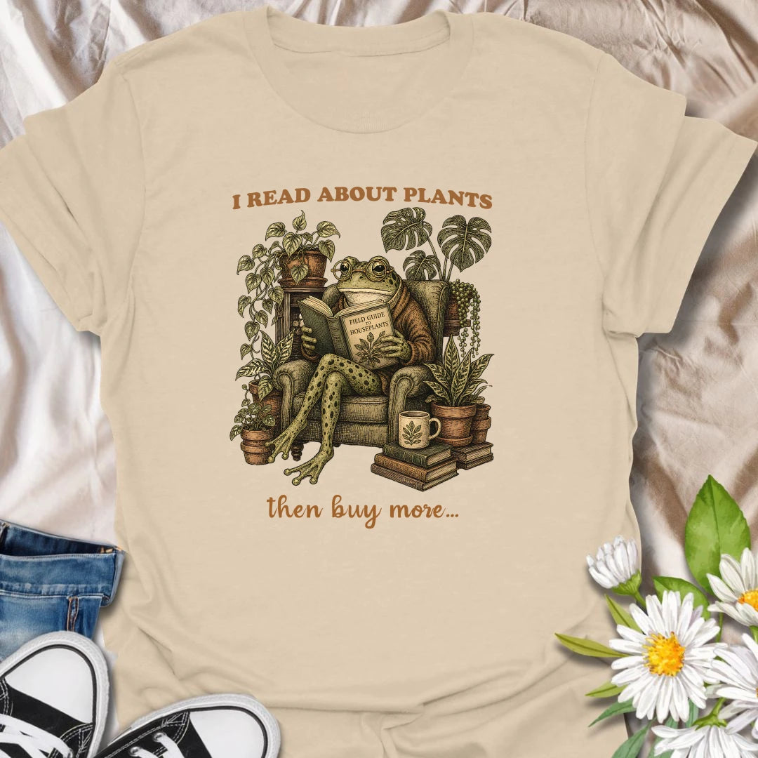 This I Read About Plants t-shirt is perfect for houseplant lovers who enjoy field guides, plant care research, and cozy botanical corners. Featuring a vintage-style frog reading a houseplant guide while surrounded by lush potted plants, books, and a mug, this design is great for plant moms, plant dads, indoor gardeners, frog lovers, and anyone who treats plant care like a serious hobby.