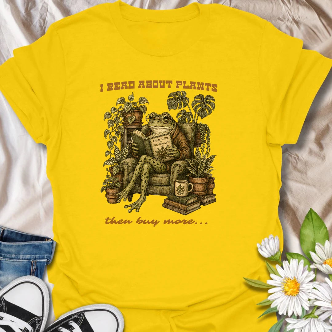 This I Read About Plants Then Buy More t-shirt is made for houseplant lovers who know learning about plants usually leads to bringing home another one. Featuring a detailed vintage-style frog reading a field guide surrounded by lush houseplants, books, and botanical details, this design has a cozy plant-collector feel with a funny relatable message. Perfect for plant moms, plant dads, indoor gardeners, frog lovers, houseplant collectors, and anyone whose plant research always ends in shopping.