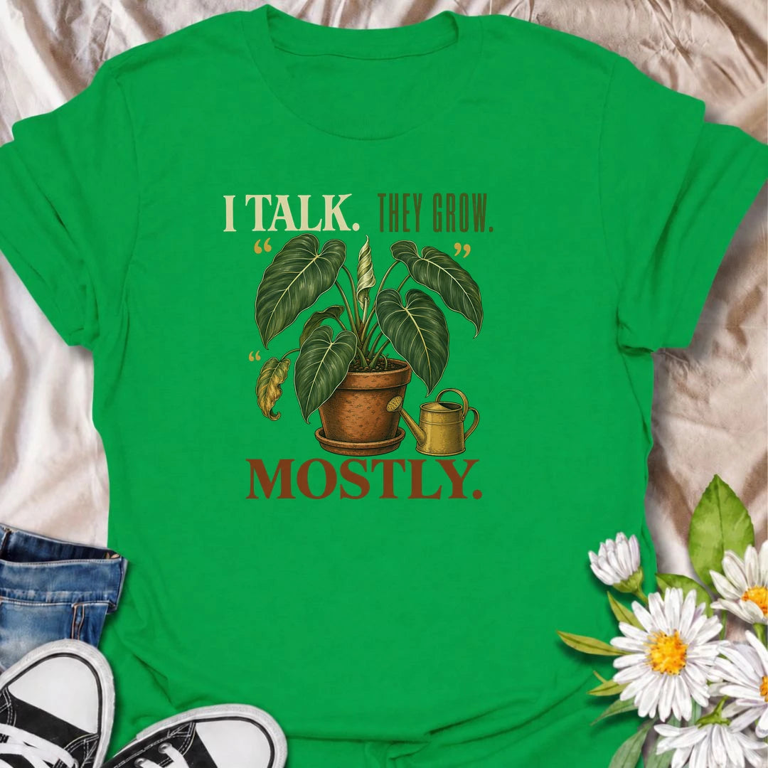 Funny plant lover T-shirt for anyone who talks to their houseplants and likes to believe it helps. Featuring a large vintage potted plant and playful “I Talk. They Grow. Mostly.” wording, this is a fun shirt for indoor gardeners, plant parents and enthusiastic houseplant collectors.