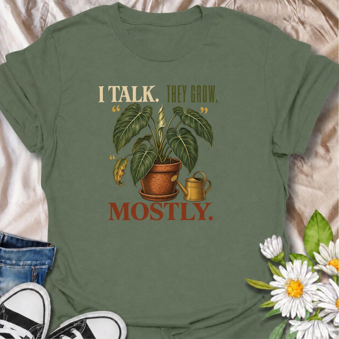 Funny plant lover T-shirt for anyone who talks to their houseplants and likes to believe it helps. Featuring a large vintage potted plant and playful “I Talk. They Grow. Mostly.” wording, this is a fun shirt for indoor gardeners, plant parents and enthusiastic houseplant collectors.