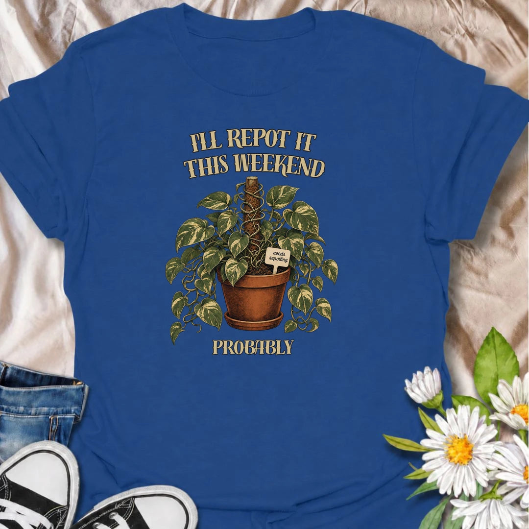 A funny plant T-shirt for anyone who keeps putting off that repotting job for just one more day. Featuring a lush trailing houseplant in a terracotta pot with a cheeky “Needs Repotting” tag, this design is perfect for plant parents and indoor gardeners. The phrase “I’ll Repot It This Weekend. Probably.” captures the procrastination every houseplant lover knows too well. It makes a great gift for pothos fans, plant collectors, and anyone with a growing list of plant-care jobs. Ideal for nursery trips, plant 