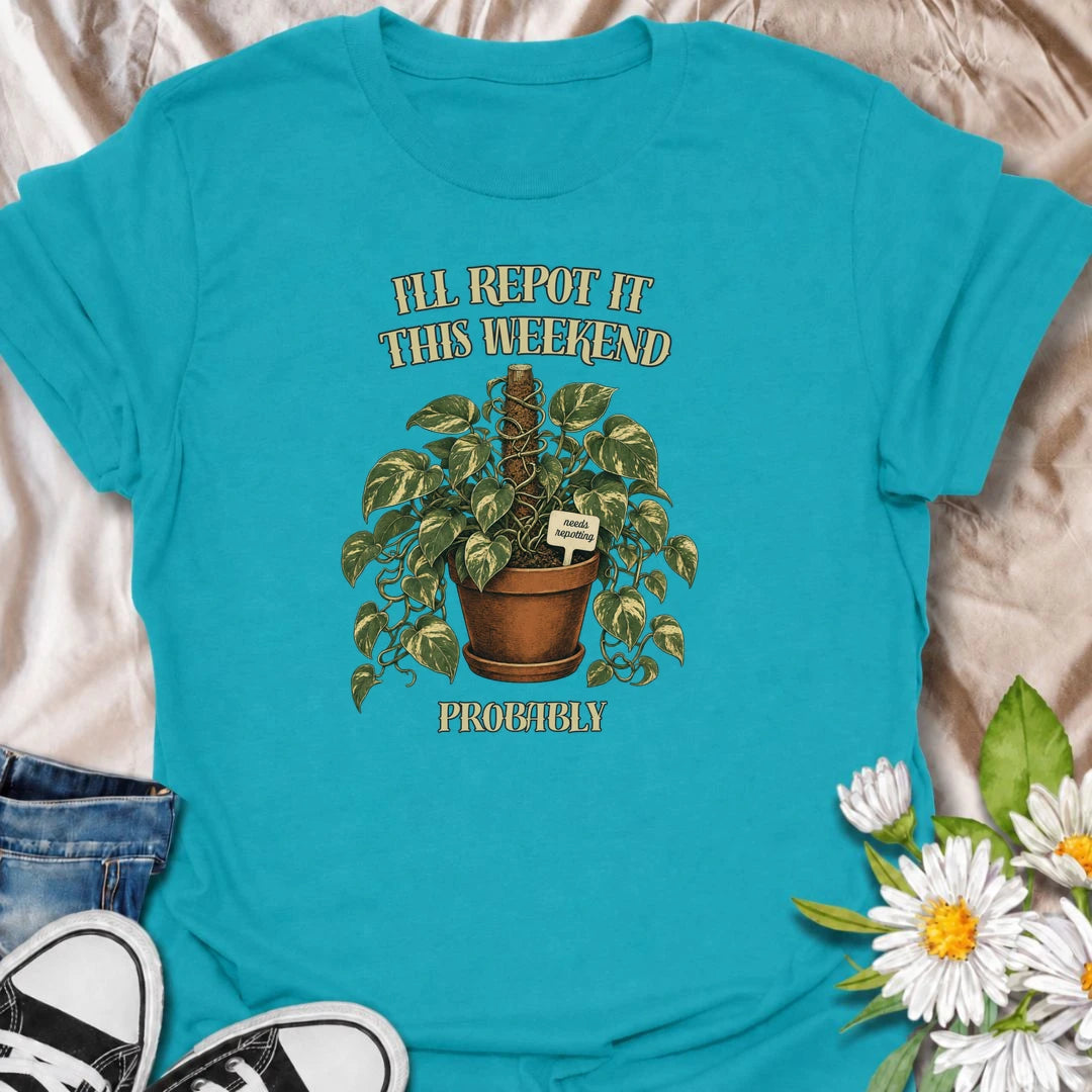 A funny plant T-shirt for anyone who keeps putting off that repotting job for just one more day. Featuring a lush trailing houseplant in a terracotta pot with a cheeky “Needs Repotting” tag, this design is perfect for plant parents and indoor gardeners. The phrase “I’ll Repot It This Weekend. Probably.” captures the procrastination every houseplant lover knows too well. It makes a great gift for pothos fans, plant collectors, and anyone with a growing list of plant-care jobs. Ideal for nursery trips, plant 