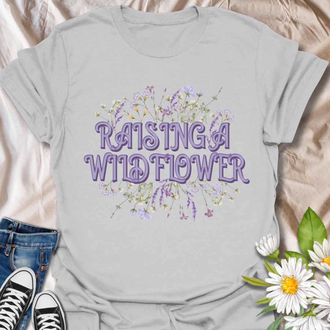 Adorable “Raising a Wildflower” t-shirt with soft pastel wildflowers and playful retro typography. A sweet tee for moms raising free-spirited kids, nature lovers, or wildflower fans. Perfect gift for proud plant moms and botanical boho style lovers.