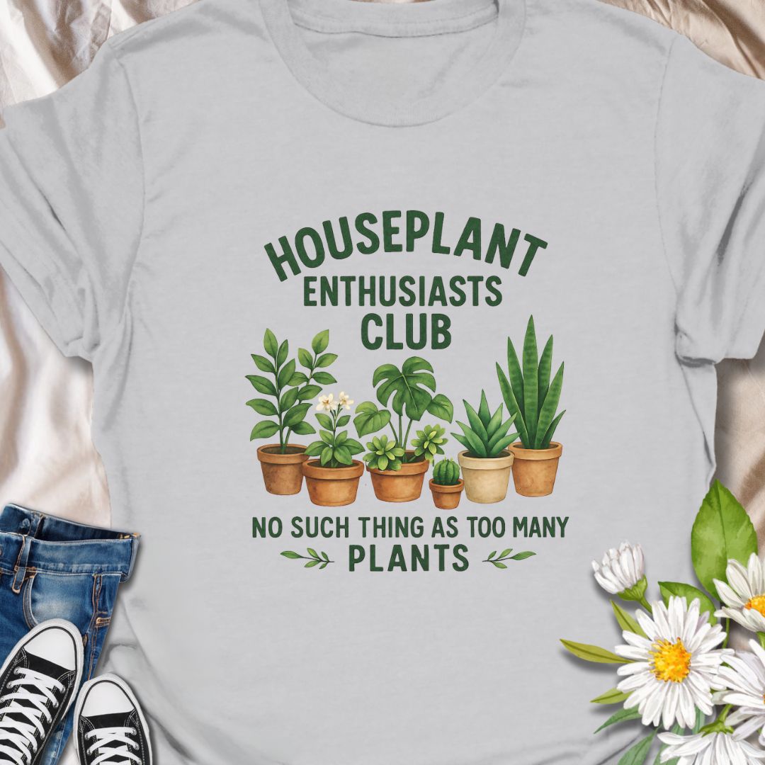 Join the green-thumbed crew with this fun and quirky “Houseplant Enthusiasts Club” shirt. Featuring a lineup of adorable potted plants, this tee is perfect for indoor plant lovers who believe there’s no such thing as too many plants. A must-have for houseplant collectors, plant moms, plant dads, and foliage fanatics.