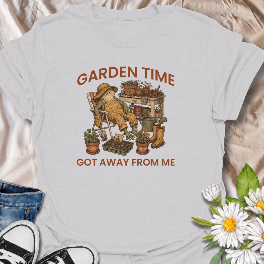 Celebrate losing track of time in the garden with this funny “Garden Time Got Away From Me” T-shirt. Featuring a relaxed frog surrounded by pots, seedlings, gardening tools, and muddy boots, it perfectly captures an afternoon that turned into an all-day garden session. A charming gift for gardeners, plant lovers, and anyone happiest pottering outdoors.