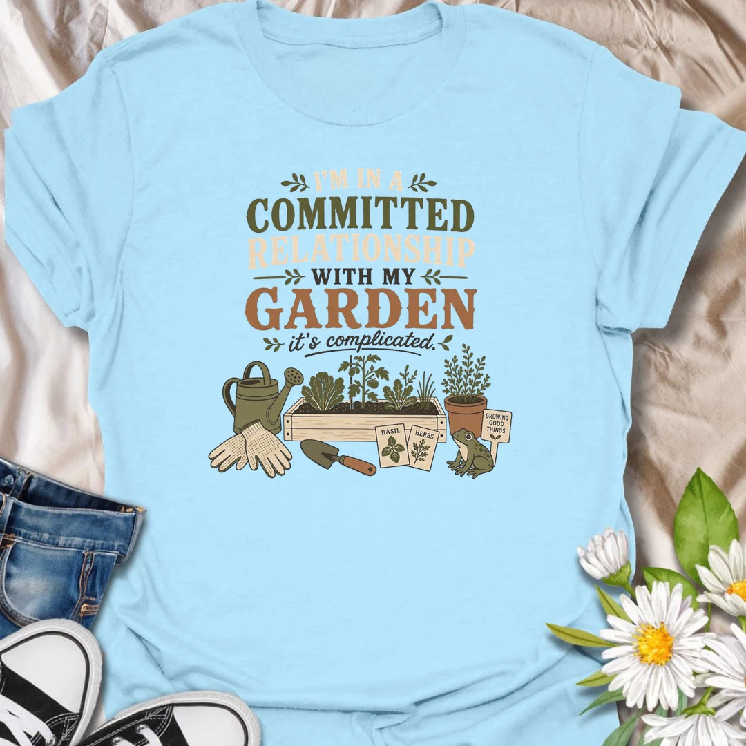 Celebrate your most dependable relationship with this funny gardening T-shirt. Featuring the phrase “I’m in a Committed Relationship With My Garden,” it is perfect for gardeners who would rather spend their time among plants, herbs, and raised beds. A charming gift for garden lovers, plant moms, and backyard growers.
