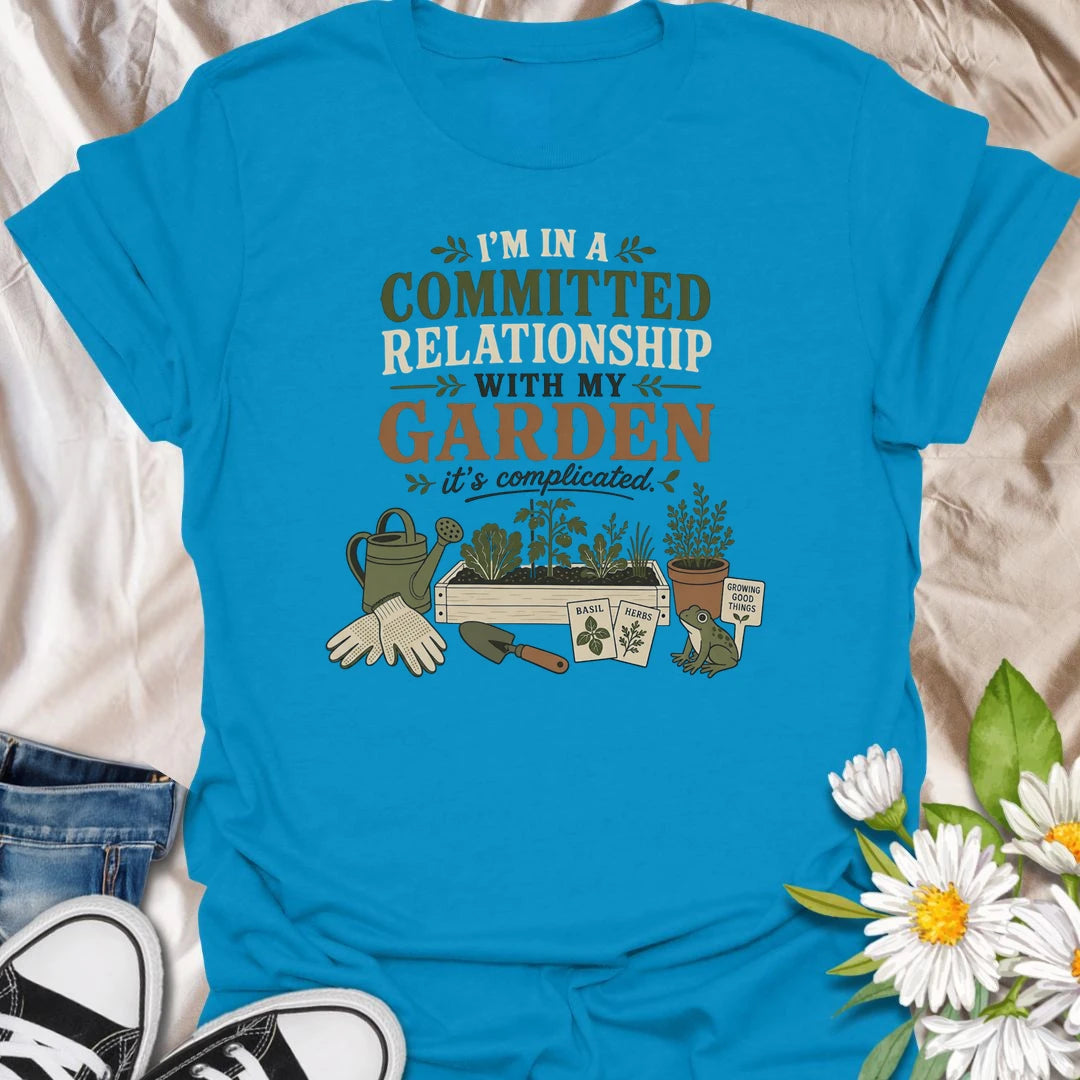 Celebrate your most dependable relationship with this funny gardening T-shirt. Featuring the phrase “I’m in a Committed Relationship With My Garden,” it is perfect for gardeners who would rather spend their time among plants, herbs, and raised beds. A charming gift for garden lovers, plant moms, and backyard growers.