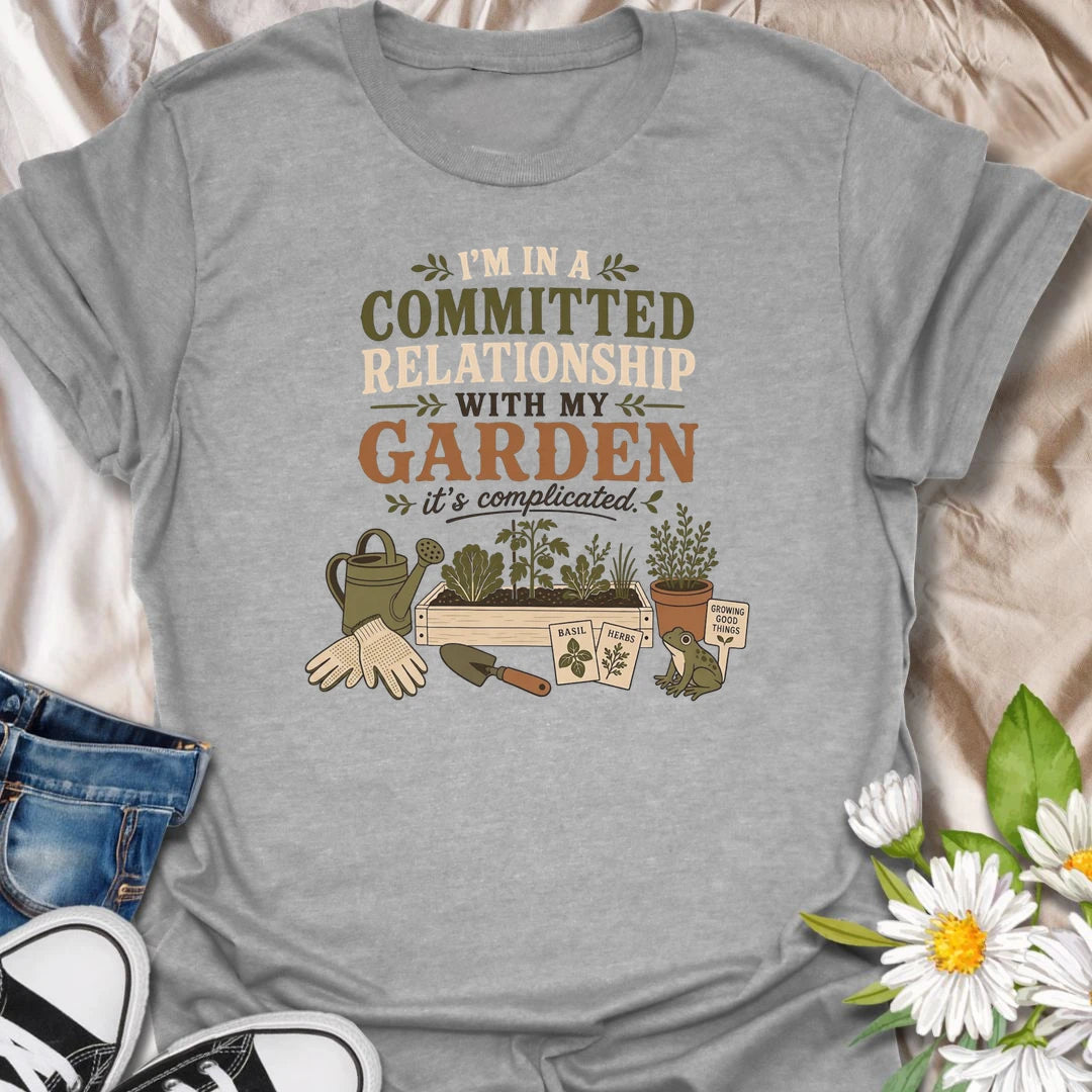 Celebrate your most dependable relationship with this funny gardening T-shirt. Featuring the phrase “I’m in a Committed Relationship With My Garden,” it is perfect for gardeners who would rather spend their time among plants, herbs, and raised beds. A charming gift for garden lovers, plant moms, and backyard growers.