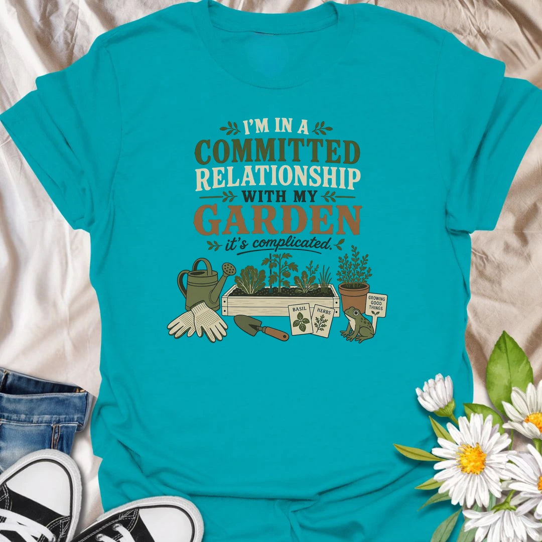 Celebrate your most dependable relationship with this funny gardening T-shirt. Featuring the phrase “I’m in a Committed Relationship With My Garden,” it is perfect for gardeners who would rather spend their time among plants, herbs, and raised beds. A charming gift for garden lovers, plant moms, and backyard growers.